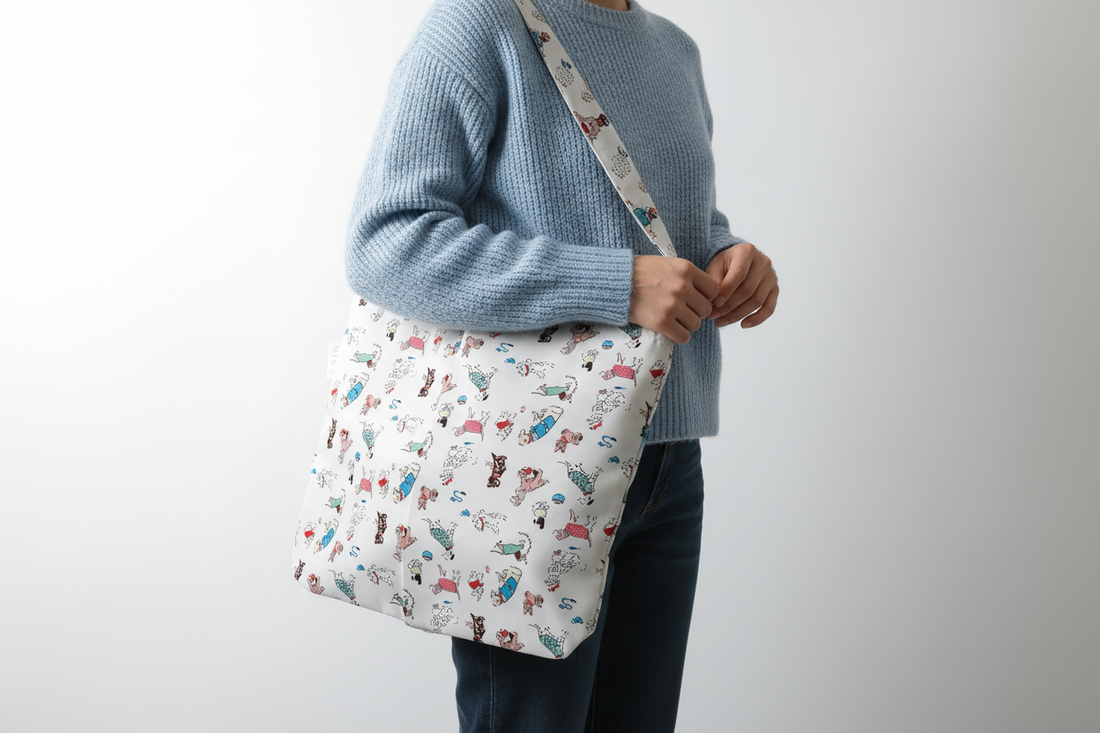 Patterned tote bag with cartoon characters on a white background