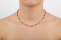Multicolored beaded necklace on a white background